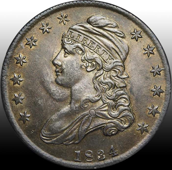 Obverse of an 1834 Capped Bust half dollar, showing John Reich's capped Liberty design.