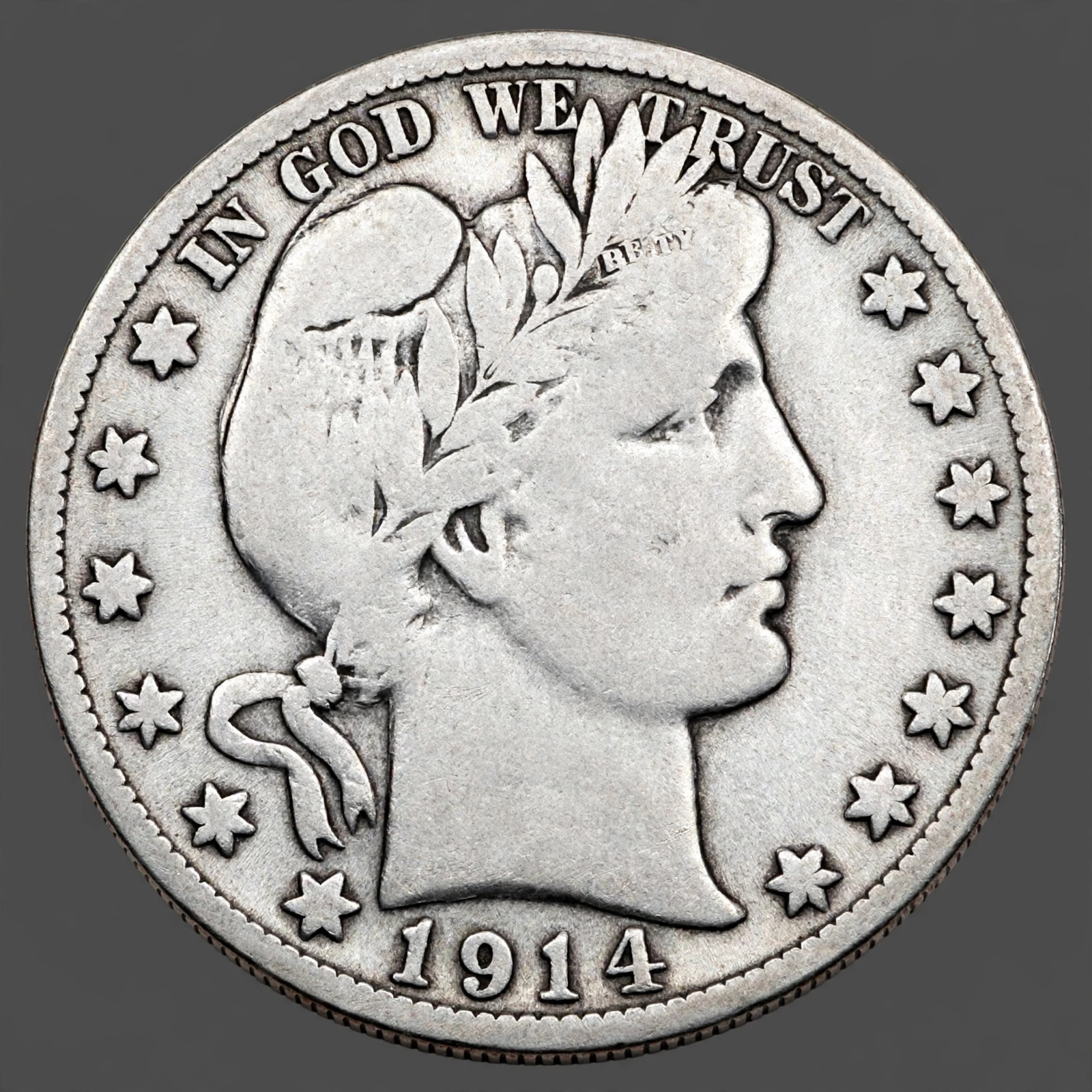 Illustration: 1914 Barber half dollar — Liberty head obverse, heraldic eagle reverse, no mintmark (Philadelphia)