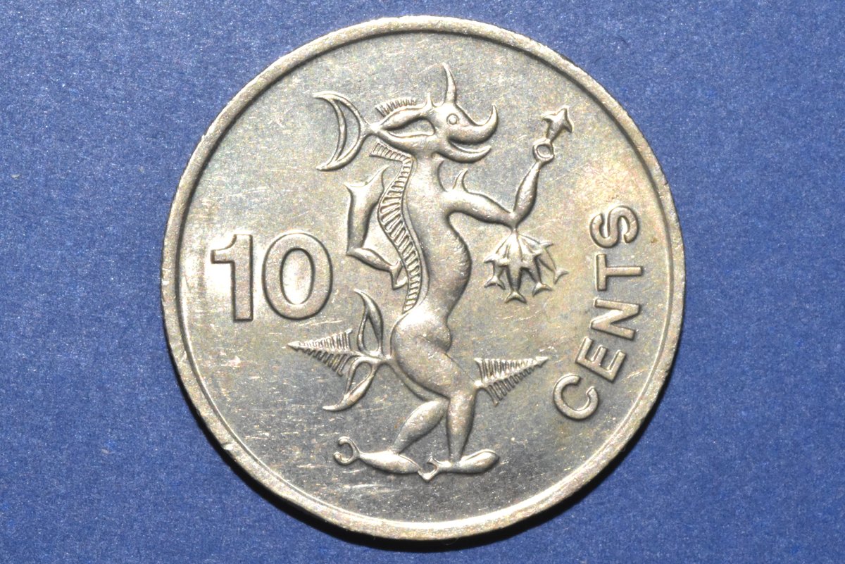 Solomon Islands 1977 10 Cents — The Ngoreru Sea God coin photo